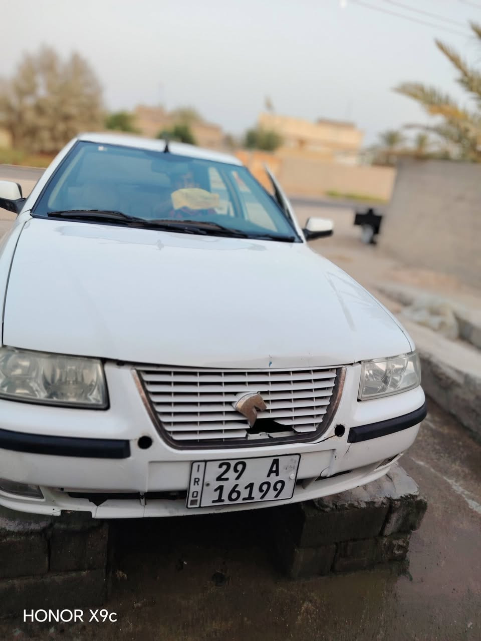 سلام عليكم سمند مديل 10
سياره خير من الله الحدايديه خير من الله 
تبريد مفول محرك مكفول الگير خير من الله تخم تاير كهرابيات كلهن شغالات وسعر 40
وبيهه مجال  ***********

نص مكتوب في الصور:
- HONOR X9c