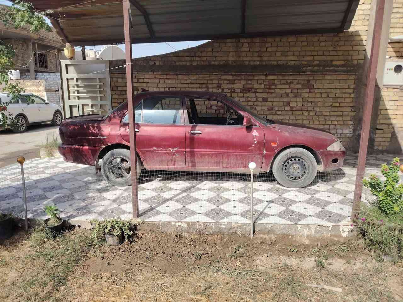 بروتون • ٢٠٠٥ • رقم بغداد