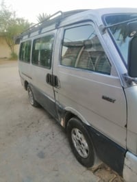كيه بسته موديل 95 رقم انكليزي واسط سيارة بلادي مكينه كير اكسل كله جديد...