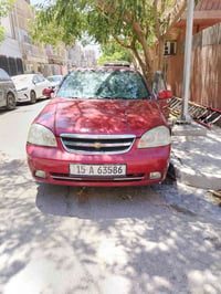 فورنزا ٢٠٠٧ للبيع مكانها بغداد الحريه السياره بيها صوت ب المحرك شغاله ...