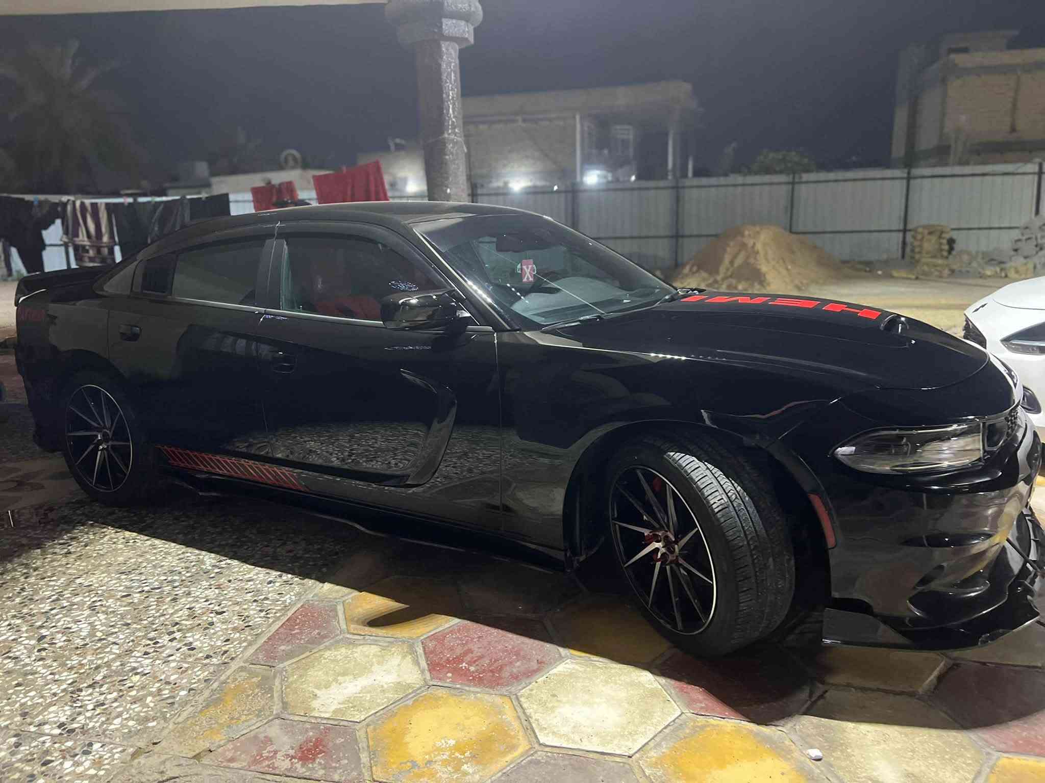 2016 Dodge Charger SXT V6
132 ML
• Engine: 3.6L V6
• Trim: SXT
• Model Year: 2016
• Transmission: Automatic
تو ويل وارد كندي كلين تايتل بالعراق صار بيها طخه باب وجاملغ السايق وتبدل نفس اللون بدون ايرباك 
مواصفاتها عاديه بس اني مزود عليها مواصفات مثلا 
شفتات ستيرن 150 $ دمام خلفي هوه وشده 250 $ شاشه جبيره اصليه SRT 400 $
ويل 20 جديد وحيل نضيف 500 $ تخم تاير امامي 245 وخلفي 275 تخم استدات طلقه 
داعميات امامي خلفي SRT 
دركه رياضي 250 $ وسستم اناره داخليه متغيره 100 $ 
مازدات اصليه ولد وعدسه متغير وبلوجكترات اصليه 500 $ كزوزت موبار منفصل اصلي قفايص 300 $ صوتها يجنن ولا جنها V6 وكت كامل SRT من سبايدر ودوس وسكوبات بيبان وجام ولحايه ودفيوزر وحلوك CORSA 
سستم دواخل كاربون فايبر 100 $ دواخلها شوط شركه حيل نضيفه فلنجات اماميه مشيفه رياضيه 150 $ دسكات موبار صدر رايسنك الاصلي دبلات جدد اصليه بلكات شابيون بلاديات دبل فان المراوح 600 الف هنه والولد 82 يعني انسى شي اسمه حماوه 
وعليها برمجه دعسه وفتح فصله يم ايلياس 
عليها سترس بار اصلي وشوته رياضيه KN 200 $ 
اويل كاتج كان 
راديتر جديد واتر بم جديد دهل كله لوكاس 5/20 وفلاتر اصليه وبانزين كله محسن شرط احمر اديرلها وفيتبم جديد موبار تفصيخ البنيد مالها محدث فقط والسياره باسمي شخصيا رقم سليمانيه السياره هواي مصروف عليها الله شاهد 
سعرها 178 وبيها مجال بسيط ومكانها بغداد 
***********
قبل اسبوعين مطلعها من مركز بوليش ونانو سيراميك عنايه متكامله وباتر AC DELCO اصلي
