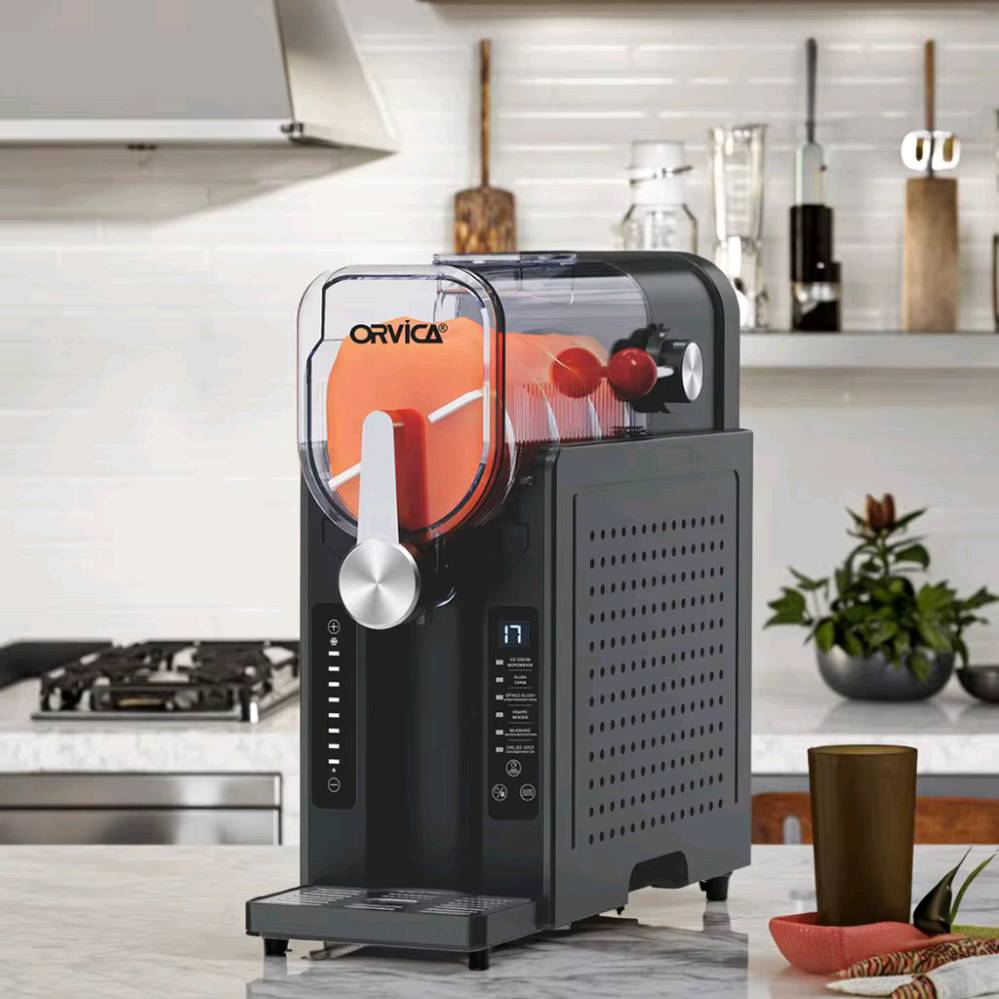 هذه هي علبة ماكينة السلاش والآيس كريم الأوتوماتيكية من ماركة أورفيكا (ORVICA Slushie Machine) موديل ORM-2408B.المواصفات والميزات الرئيسية:الاستخدام (6 في 1): ماكينة متعددة الوظائف مبرمجة مسبقاً بـ 6 إعدادات ذكية لتحضير (الآيس كريم، السلاش، السلاش الغازي، الفرابيه، الميلك شيك، ومبرد العصائر).السعة: خزان يتسع لـ 1.5 إلى 1.6 لتر.الطاقة: مكتوب على العلبة قوة محرك قصوى تصل إلى 2000 واط (مع استهلاك طاقة فعلي للتبريد والتشغيل يبلغ حوالي 150 واط).تقنية التبريد: تعتمد على نظام تبريد داخلي مدمج بـ (كمبريسور) عالي الكفاءة يغنيك تماماً عن الحاجة لإضافة الثلج.الحفاظ على البرودة: مزودة بخاصية الحفاظ على قوام المشروبات مثلجة لمدة تصل إلى 12 ساعة متواصلة.التحكم: شاشة لمس أمامية رقمية (LED) لعرض واختيار الأنماط والتحكم بدرجة الحرارة                                                                                                                    القياسات :-  ارتفاع 38. الطول 36.  العرض 16.