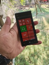 للبيع موبايل HTC نضام وندوز فون شغال ونضيف عربي 07711077355 0781107735...