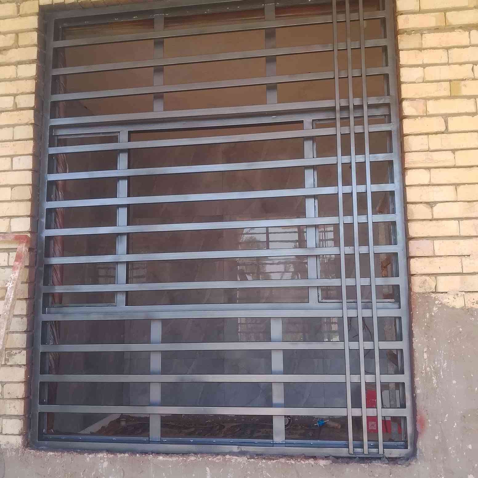 تنظيف شبابيك • صبغ شبابيك • نجف الحرية