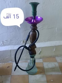 ستاند ملابس • لوحة • مزهرية