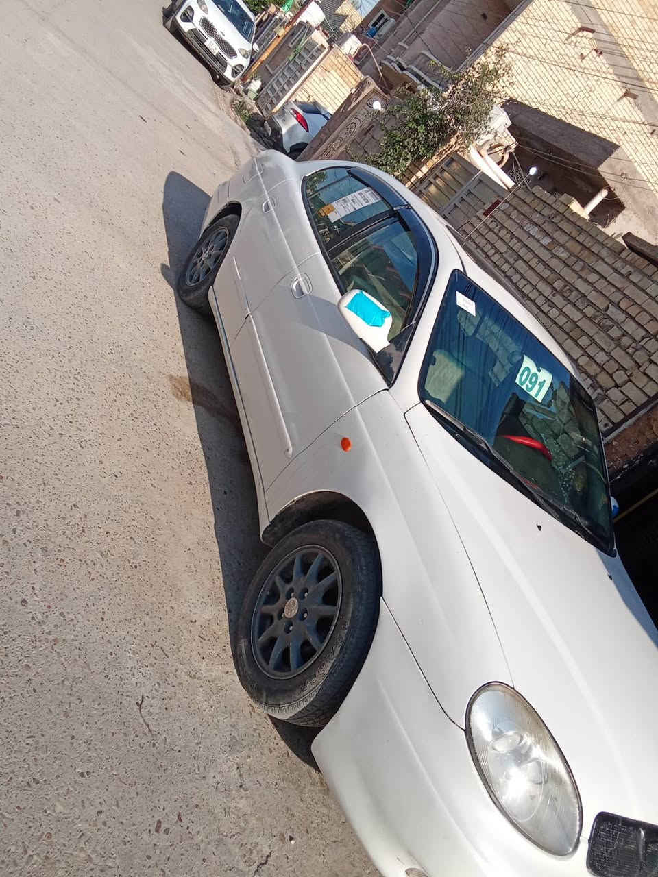 لكنزا 2000 كير محرك تبريد مكفول
*********** الشراي يتصل مكان بغداد الشعب 
محرك اوتوماتيك 
تخم تايرات 
صدر جديد 
سنتر لوك شاشه لمس 
رقم الجديد بغداد 
سيارة نضيفه
