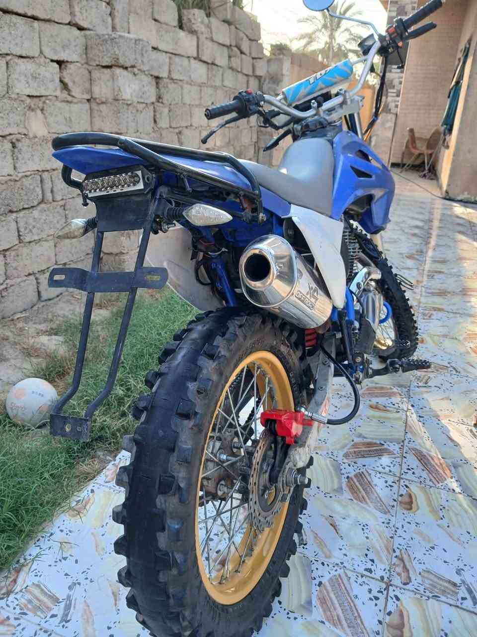 للبيع دراجه قفاز CRX حجم المكينه 300cc موديل 2023الدراجه نضيفه ولدراجه ممفتوحه الدراجه نقصهة بريك خلفي ودشلي مال سلف مسحوك يرادله تبديل رخيص هسه اني اشغلهة دفعه هيه تشتغل هندر بس مكينه جبيره الهندر يرجع عليه قوي بس دفعه اشغلهة بس تبديل دشلي الدراجه ترجع نكره تخبل شلعه سرعه فول خير من الله مبينه بالصور نضيفه وخير من الله  السعر 900 وبيهة مجال قليل حك الجيه المكان ديالى الاستفسار ***********
.
