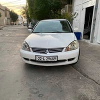 لانسر • ٢٠١١ • ٤ قطع بوية