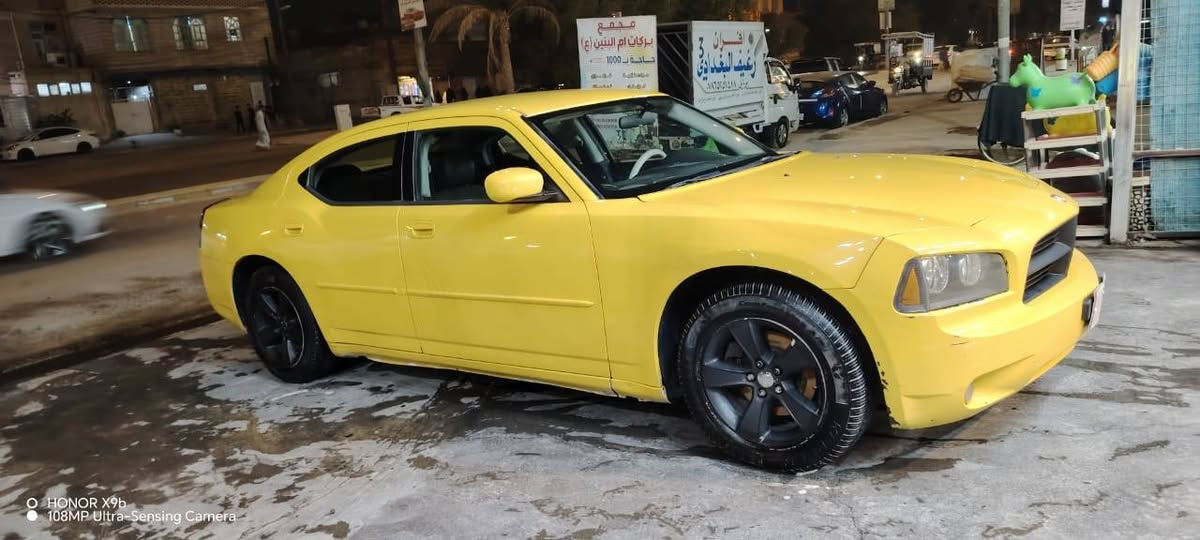 جارجر 2010للبيع سيارة جاهزه خطها نجف بغداد السعر 100 وبيها مجال  الرقم ***********

