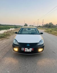 لانسر ٢٠١٠ • محرك ١٥٠٠ • رقم بغداد