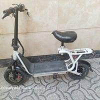 سكوتر • أبيض • يحتاج بطارية