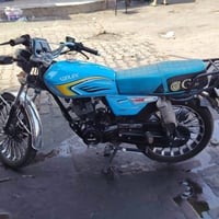 دراجه جديده ماشيه 30000 زيرو بعده عارضه 950 وبيه مجال 07721695332
