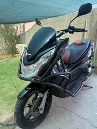 PCX الجيل الاول • ١٢٥ • نقصها روله