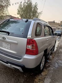 كيا سبورتج موديل 2009 خليجي  كير مكينه مكفولات تخم تاير جديد  صدر امام...