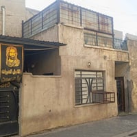 بيت للبيع في الامين مساحة 128واجهة 12 مشتملات ثنين مقسم مئاجرات ثنينهم...
