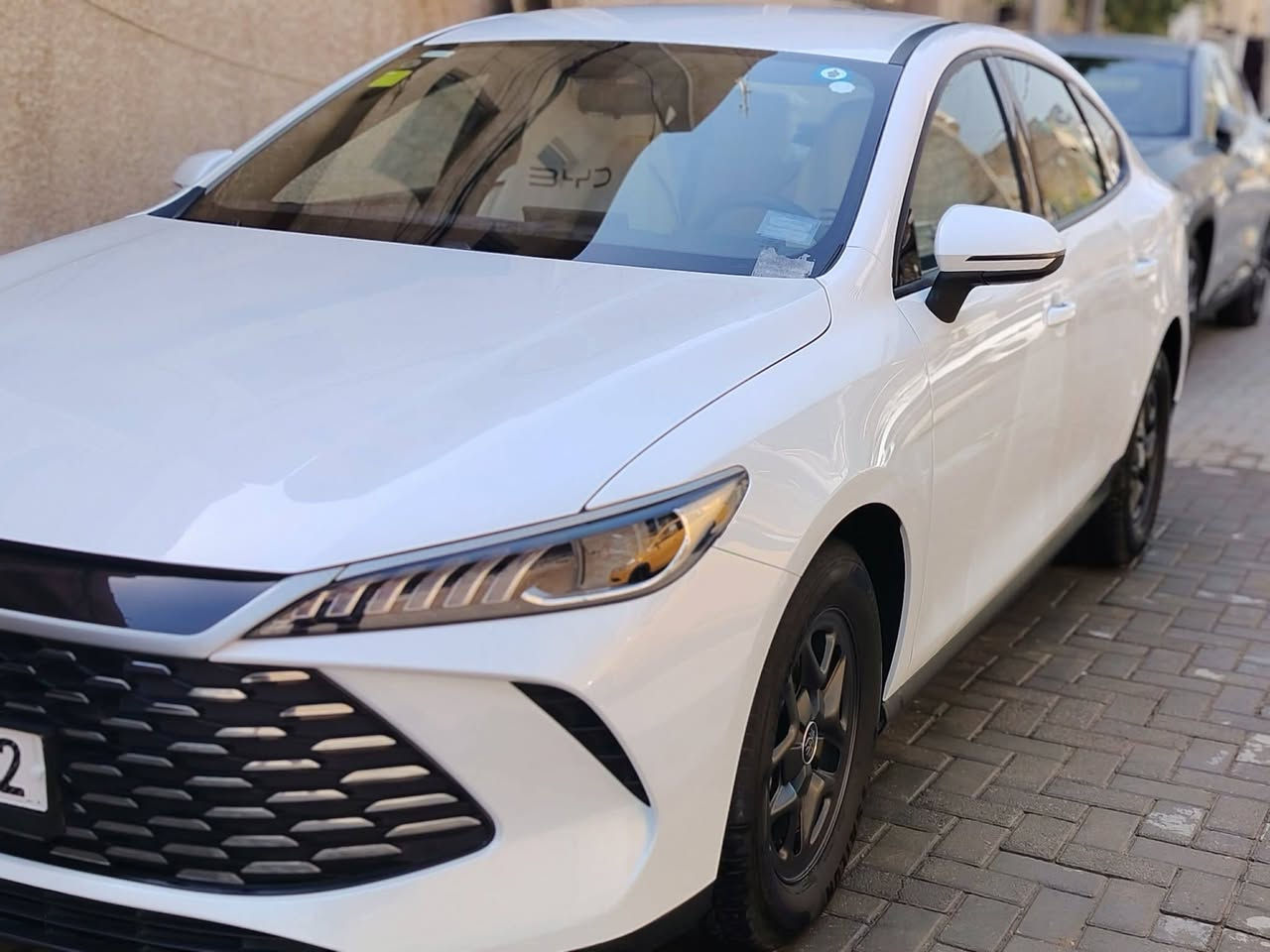 ✅✅بي واي دي  BYD Qin Plus   داخل أبيض
✅✅سنة الصنع 2025  ماشية 2000كم وقابلة للزيادة 
✅✅حجم المحرك 1500cc 
✅✅بطاريه ليثيوم شفرة byd 
سيارة سيدان مدمجة بنظام هايبرد PHEV 
✅✅تجمع بين محرك بنزين هايبرد   بلكن ومحرك كهربائي
✅✅ بطارية ليثيوم شفرةbyd تدعم الشحن السريع
✅✅ شاشة   إنش بنظام ملاحة وتحديثات OTA
✅✅ نظام صوتي بـ6 مكبرات صوت + ميزة الكاريوكي
✅✅ حساسات وكاميرا خلفية – مثبت سرعة – مقاعد جلد 
✅✅ تصميم خارجي عصري بمصابيح LED ومقصورة عازلة للصو
✅✅اوتو ستوب
✅✅حساس خلفي 
✅✅اوتو هولد AUTO HOLD 
✅✅هند بريك بصمه 
✅✅تشغيل السياره بصمه مع
 كارت دخول ذكي
✅✅مقاعد جلد 
✅✅لايت زينون 
✅✅لد نهاري LED
✅✅بك لايتLED
✅✅3انضمة للقيادة 
✅✅مانع تزحلق
✅✅مثبت سرعه  Cruise 
✅✅تشغيل عن بعد 
✅✅شاشة ذكية
✅✅ سعة الخزان 65لتر   اتمشيك 2100 كم
مكاني بغداد الزعفرانية الاتصال واتساب 
***********

نص مكتوب في الصور:
- 12:03 ص
- 12:04 ص
