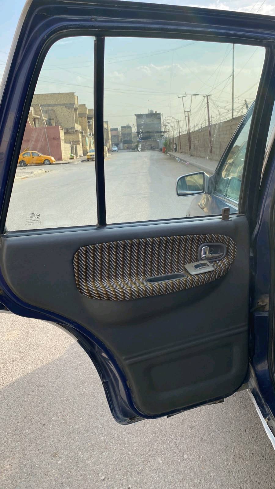 كيا سبورتج • ٩٩ • رقم بغداد