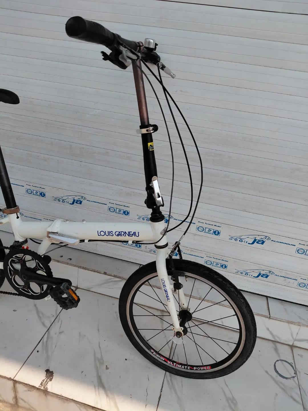 LOUIS GARNEAU FOLDING BIKE حجم 20 المنيوم بالكامل    ✈يوجد توصيل لجميع المحافضات ✈ كركوك مدخل سايدين حي الاسرى والمفقودين  معرض ابو شيفان ( *********** )
