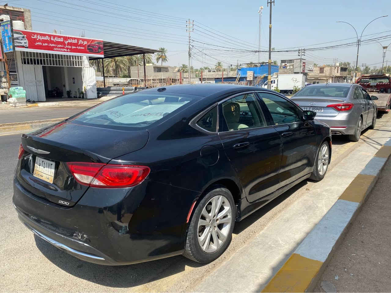 بيه ٤ قطع صبغ يعني حزام 
كهربائيات كامله 
كير جديد 
مكينه بس اول تشغل الصبح ومن اوگف والسياره مشتغله 
بيه تبخير 
حالوب ب القماره والسونار موجود 
تبريد تلج ❄️
شاشة بلاديه 
كاميرا خلفية
كشن كهرباء 
عليه غرامه 200 الف 
وأبو السنويه يطلب ورقتين ينزلون من السعر 
سنوية لل2028  رقمها بغداد
كل التفاصيل مذكوره 
*********** كربلاء, العراق

نص مكتوب في الصور:
- الجزء العلوي
- يوجد خدوش ورصعات في المكان المحدد