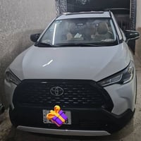 كورلا كروز هايبرد رقم بغداد محرك 2000 موديل 2025 ماشيه 27 الف  مواصفات...