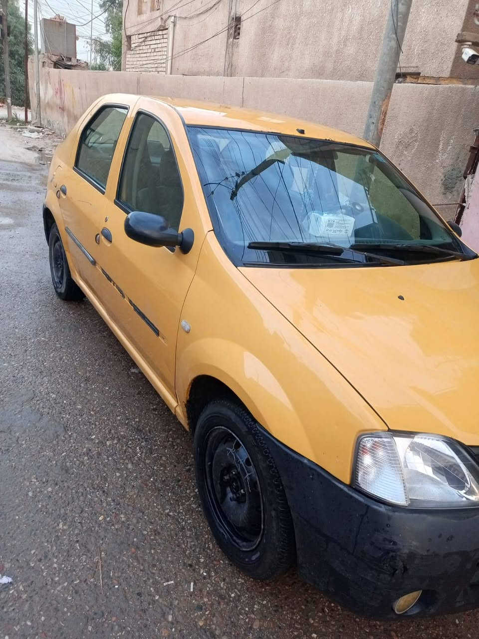 رينو لوجان • بيها مجال