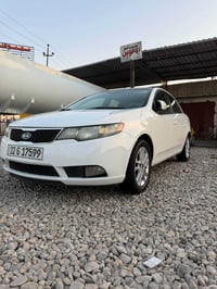سيراتو موديل 11   خليجي رقم ربيل بسمي السياره بيها قطعتين صبغ كير وميك...