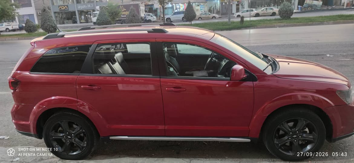 دوج جورني2018 كروس رود حادث بسيط بس دعامية شرط بدون صبغ بدون ارباك كامرة شاشة كبيرة flexfuelيعني اي بنزين تخلي ما يدك بلاص سنوية جديدة۲۰۳۰ تبريد ثلاثةقطع  سعر۱٤٥ورقة وشوية بيها مجال

نص مكتوب في الصور:
- SHOT ON MI NOTE 10 AI PENTA CAMERA 27/09/2026 05:43
- SHOT ON MI NOTE 10
- AI PENTA CAMERA
- 27/09/2026 05:43