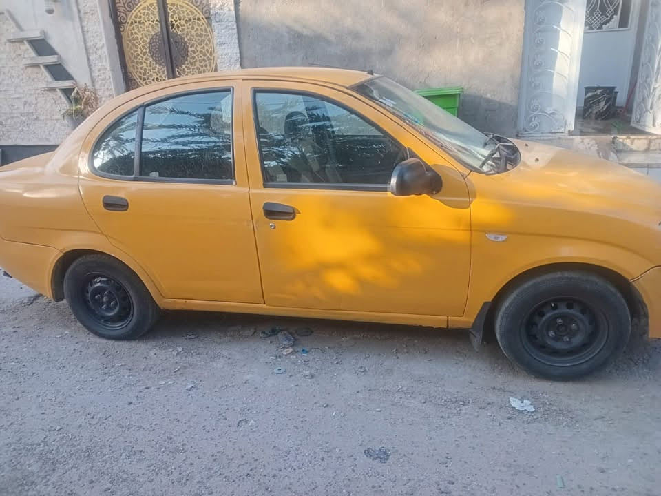 السلام عليكم ((طيبة للبيع موديل 2015 رقم بغداد وانكليزي  التبريد عاطل وبيها ضربة بالجاملغ الخلفي للسايق السعر 33 وبيها مجال سيارة بأسمي وثاني يوم التحويل العنوان بغداد مدينة الصدر للاستفسار والتواصل على رقم *********** مكلف بالنشر الاتصال على رقم واتساب ورصيد
