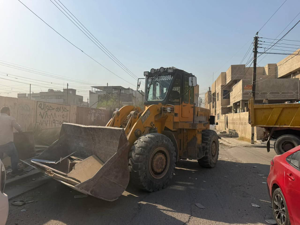مدرسه دجلة الخير
رفع الانقاض  
اخوكم أبو جعفر ***********

نص مكتوب في الصور:
- ***********