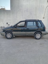 مسيوبوشي سبورتس سيارة بلادي بدون صبغ تخم تاير جديد. كير عادي محرك 2000...