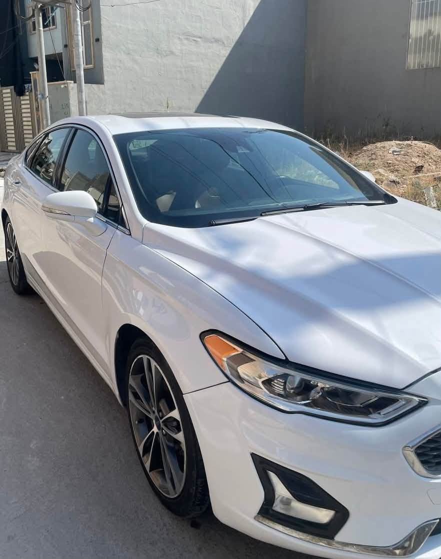 Ford Fusion Titanium 2019 للبيع

• الفئة: Titanium اعلى فئة
• المحرك: 2.0 EcoBoost تيربو 
• الممشى: 95,000 ميل
• المواصفات: Titanium فل أوبشن
* القوة: 245 حصان تقريبًا
* العزم: 275 lb-ft
* الجير: أوتوماتيك 6 سرعات 
* الجنوط: 19 إنچ
* المقاعد: جلد 
* المقاعد الأمامية: كهربائية، مع تسخين وتبريد ( مقعد السائق ذاكرة خزن)
* تحكم صوتي
* نقطة عمياء
* دركسون: مدفأ
* فتحة سقف
* شاشة SYNC 3 قياس 8 إنچ
* Apple CarPlay / Android Auto
* نظام صوت Sony
* كاميرا خلفية + حساسات
* تشغيل عن بُعد
* دخول وتشغيل بدون مفتاح
* مثبت سرعة
* أنظمة أمان ومساعدة للسائق 
* وهواي مواصفات بعد
- الضرر الجاملغ والبنيد مبدلات غير لون ومصبوغات بخ بأمريكا 
- السعر 125 ومجال بسيط
تواصل - ***********

نص مكتوب في الصور:
- BidFax.info