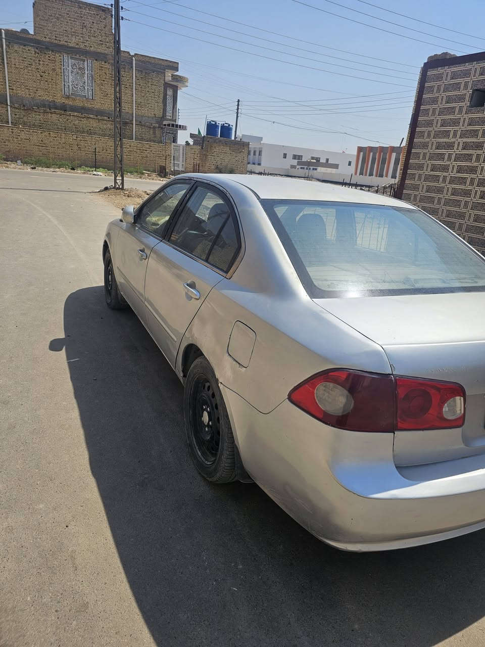 اوبتيما موديل سبعه وارد أمريكي محرك ٢٠٠٠ نمركير خمسه حداديه جيد  ه  كهرباء تبريد يشتغل بيه ضربه من ابلتة الجنيه جوه رقم السياره من الخلف بيه سونار  مصبوغه حزام مكفوله من العيب الشرعي السعر ٨٠ بيه مجال الاتصال ***********  الشطره

