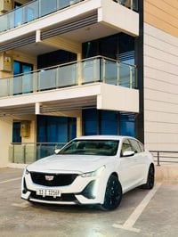 كاديلاك CT5 2023 السعر:227 اللون ابيض حجم المحرك 2000 تيربو كير 10 نمر...