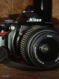 نيكون D3000 • عدسة ١٨-٥٥ • بطارية جديدة