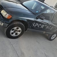 سبورتج موديل 1995سياره مصبوغه مكينه وكير جديدصدرجديد تايرات جديدمكان س...