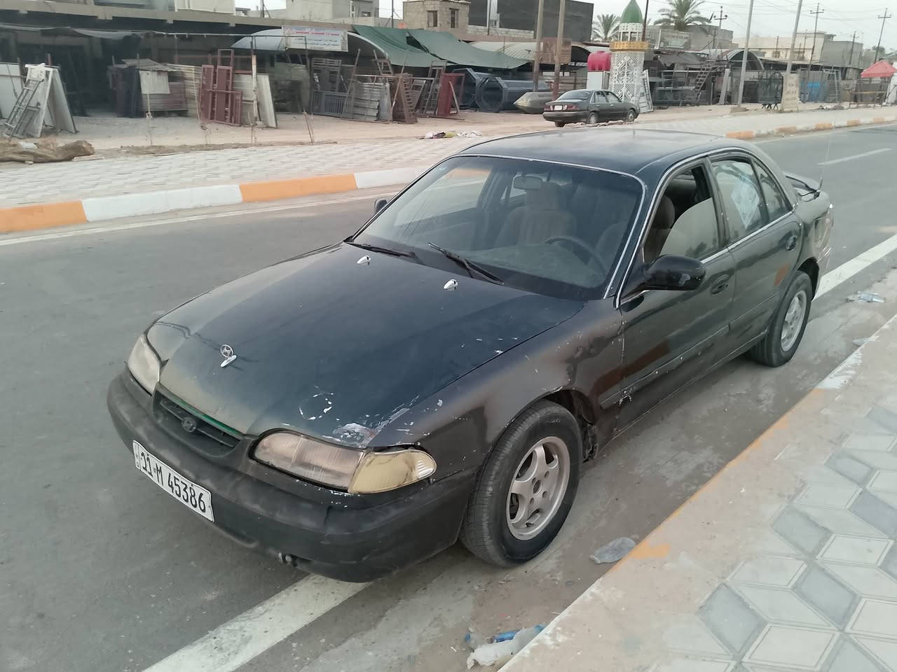 سوناتا 2
كير اوتو نضيف
مكينة بيها خيط ضعيف
رقم بغداد دولي الجديد سنوية لل 29
كشر شوفة عينكم يرادلها حزام 
تخم تاير نضيف 
داخل بلادي ارضية جلد
منضومة بانزين جديدة 
السيارة مال تمشية حال خير من الله جاهزة 
سعرها 28 وبيها مجال سعر النترا 
مكاني ديالى الخالص 
***********
