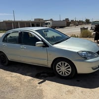 لانسر بومة • ٢٠٠٨ • مكينة مكفولة