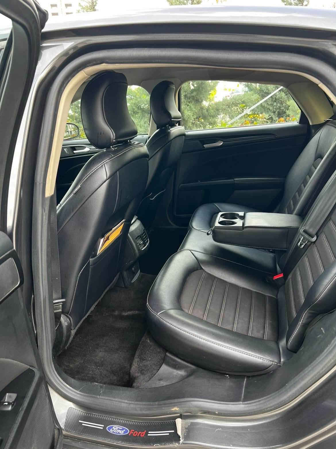 سه ياره كه  10  وه ره قه غرامه ي تيايه دواي مه عامه له بؤت ئه گيرمه وهنرخ:105مه عامه له‏
‏ford Fusion 2018مەکینە  2.5رەنگ نەوتی شتی نموونە و دانسقە 
‏‎فۆرد فیوشن  ( - تەحدید سورعە - سوکان ڤۆلیۆم - تراکشن ( دژە خلیسک) - کۆدی دەرگا - کوشن جلد و کوشن کارەبا و کوشن هیتەر و ئاوێنە هیتەر نیزامی تەبرید لەمس و سەکن و سایەق جیایە ) 
‏‎سەیارەکە دەمێکە لای خۆمانە و کامل سێرڤسە  دو پارچەی بۆیاخە
تایەی تازەیە  و پاتری تازە هەموو گیانی بە شەرت دینارێک مەسرەفی تیا نییە گێر و مەکینە و تەقە و ڕەقە هەموی بەشەرت
سه ياره كه 3 شاشه يه *********** سليماني

‎السيارة عليها غرامة 10 ورقات (1,000 دولار)، وسوف أخصمها لك بعد المعاملة.
‎السعر: 105 ورقة (10,500 دولار) مع مجال للمفاوضة.
‎ الموديل: فورد فيوشن 2018 (Ford Fusion 2018)
‎ المحرك: 2.5 لتراللون: كحلي / نفط
‎ رقم الهاتف: ***********
‎المواصفات (سيارة نظيفة وممتازة جداً):
‎ تثبيت سرعة (Cruse Control)تحكم دركسون / أزرار المقود
‎ نظام منع الانزلاق (Traction Control)
‎ كود فتح الأبوابمقاعد جلد مقاعد كهربائية
‎ تدفئة مقاعد وتدفئة للمرايا الجانبية
‎ نظام تكييف لمس مع تحكم منفصل للسائق والراكب
‎تفاصيل إضافي:
‎ السيارة عندنا منذ فترة طويلة ومعتنى بها بالكامل (سيرفس كامل).بها قطعتين صبغ (بويغ).
‎ إطارات جديدة وبطارية جديدة، وبشرط الفحص الكامل.لا تحتاج لأي مصاريف إضافية إطلاقاً.
‎ المحرك والقير والدعاميات والشاصي كلها بشرط الفحص.تحتوي على 3 شاشات.
‎للتواص
