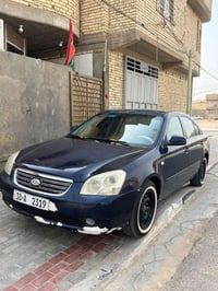 اوبتيما 2006 • مكينه 2400 • رقم بابل