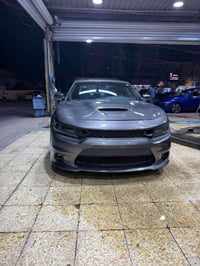 جارجر GT 2019 فول فتحه سلايد  لون نفطي  ماشية 99 ميل  السياره كلين   ص...