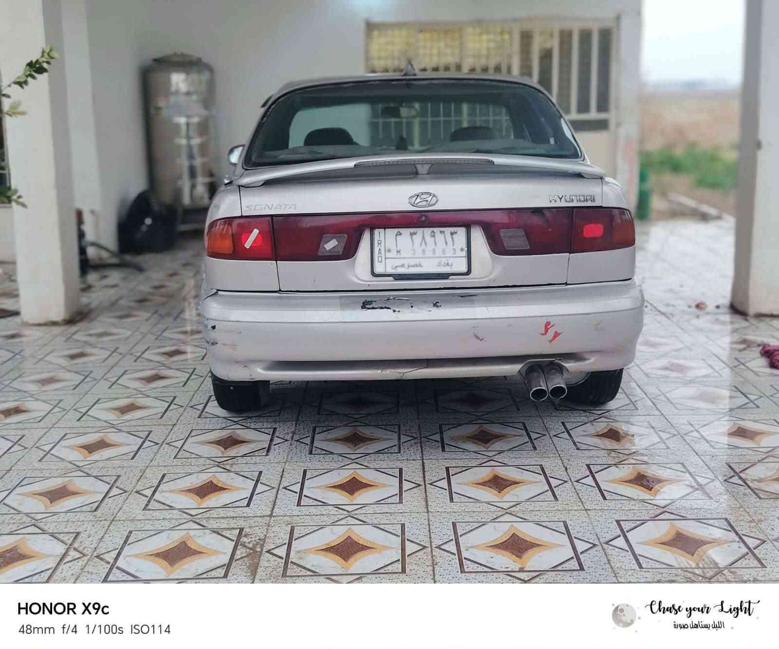 سوناته تو, ٩٤ خير من الله السياره مصبوغه حزام  على وضع الشركه
كير  محرك خير من الله  الرقم بغداد  السياره ٤٥ وبيها مجال 
رقم ***********

نص مكتوب في الصور:
- HONOR X9c 48mm f/4 1/50s ISO112 Chase your Light الليل بيستاهل صورة
- HONOR X9c
- 24mm f/4 1/33s ISO118
- Chase your Light
- الليل يستاهل صورة
- HONOR X9c 24mm f/4 1/25s ISO155 Chase your Light الليل يستاهل صورة
- 48mm f/4 1/100s ISO114
- 24mm f/4 1/33s ISO131