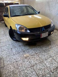 لانسر مديل 2008 انبار  اوتماتيك للبيع 53 ظربه من وره بالبدنه بدايت الح...