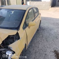 نيسان تيدا 2007 رقم بغداد مشروع وطني حادث كما موضح بالصور  السعر 22ورق...