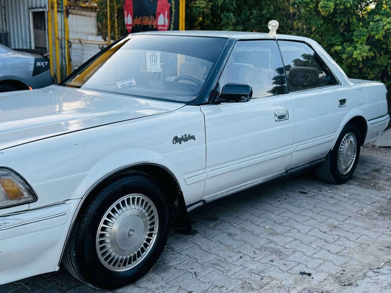 مكينة ٣٠٠ • ابيض • رقم نجف