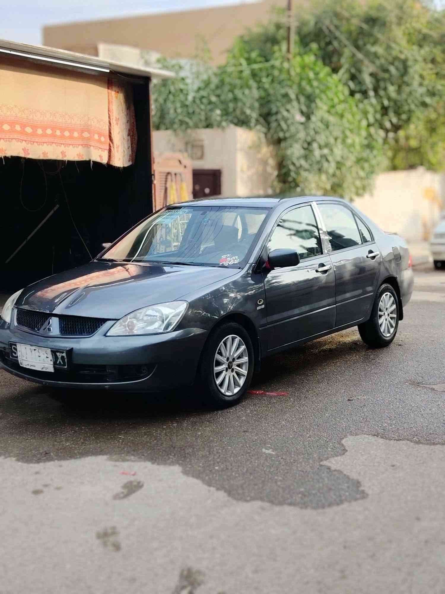 لانسر ٢٠١٠ • رقم ديالى • صبغ عام