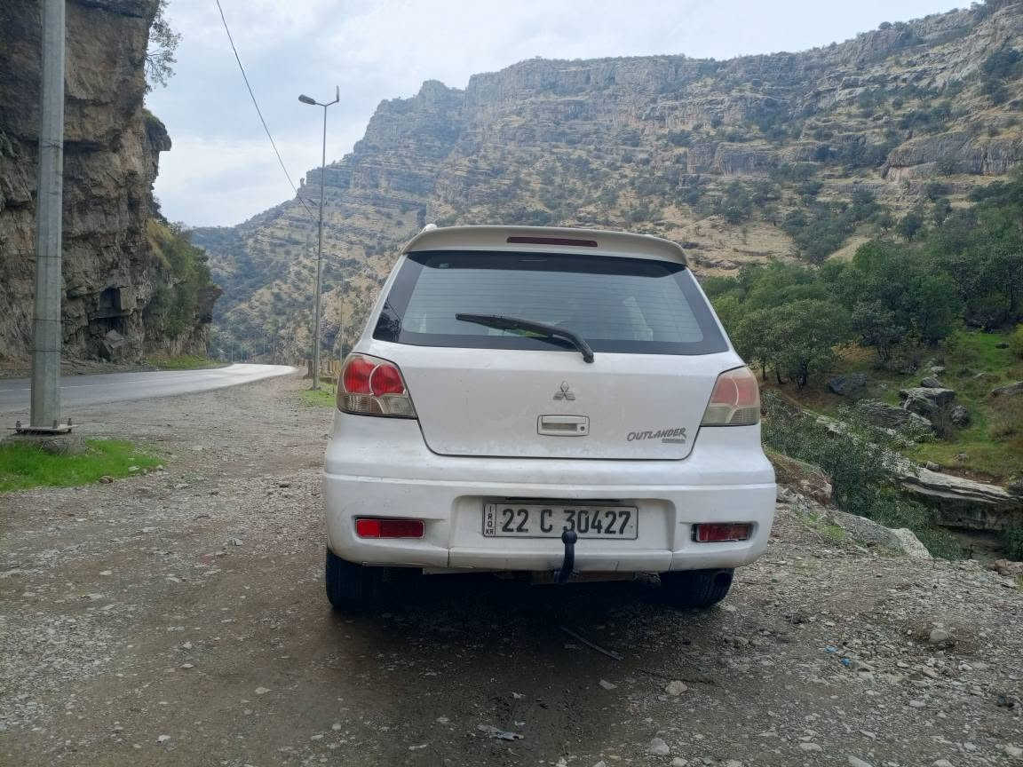 اوتلاندر ٢٠٠٣ • دبل اكسل AWD • اوتوماتيك