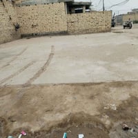 حي الكوفة • ١٣٠م² • واجهة شارع رئيسي