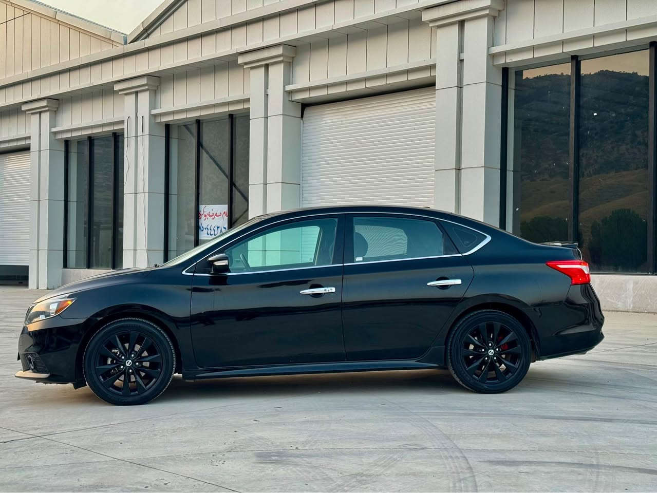 Nissan Sentra 2018 SR MIDNIGHT 
فول مواسفات تەنها سلاید نیە
گێر ئۆتۆماتیکە
گێر و مەکینەی بە شەرتە نەکراوەتەوە
ماوةى رؤيشتن 80 مايل
سوکان ڤۆلیۆم و تەحدید سورحە
تەبریت لەمس و تەبریت خەزن
کوشنەی بیلاد خەت شین و کوشنەی هیتەر
رادار و ئۆتۆ ستارت ستۆپ 
هەموو مواسەفاتەکانی ئیش دەکەن
تەنها بستەک بۆنیتی بۆیاخە 
لەگەل بستەک چاملاخ بێ ژۆرێ
دوو جێگای ساردەکوتە
ئیرباگ بە شەرت نەتەقیە
تازە سێرڤس کراوە دینار مەسرەفی نیە
نرخ 112 مەجالەکی زؤر کەم 
تکایە موشتەری تێل بکە سەرمان مەیێشێنە
جوابی نامە نادرێتەوە
ژمارە مۆبایل *********** أربيل, العراق
