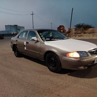 مازده 2001 626 رقم تهوك دولي تحويل ثاني يوم السياره بدون صبغ ولا معجون...
