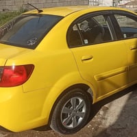 كيا ريو • ٢٠١١ • توماتيك